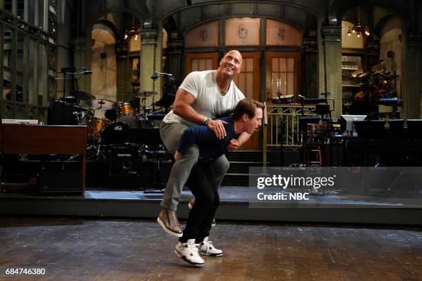 Dwayne Johnson" Episode 1725 -- Pictured: Dwayne Johnson with Beck Bennett in Studio 8H on May 16, 2017 --