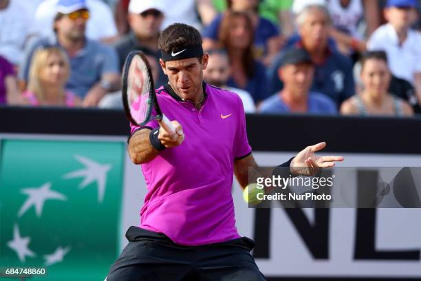 Juan Martin Del Potro of Argentina returns the ball to Japanese Kei Nishikori during the ATP Tennis Open tournament on May 18, 2017 at the Foro...