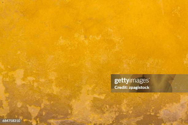 yellow wall texture in tuscany - peeled stock pictures, royalty-free photos & images