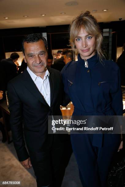 President of Interparfums, Philippe Benacin and actress Pauline Lefevre attend the Montblanc : Champs-Elysees Flagship Reopening on May 18, 2017 in...