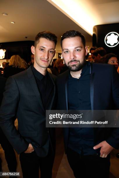 Actor Pierre Niney and Xavier Pincemin attend the Montblanc : Champs-Elysees Flagship Reopening on May 18, 2017 in Paris, France.