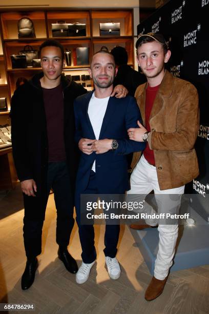 Actors Corentin Fila, Cedric Kahn and Kacey Mottet-Klein attend the Montblanc : Champs-Elysees Flagship Reopening on May 18, 2017 in Paris, France.