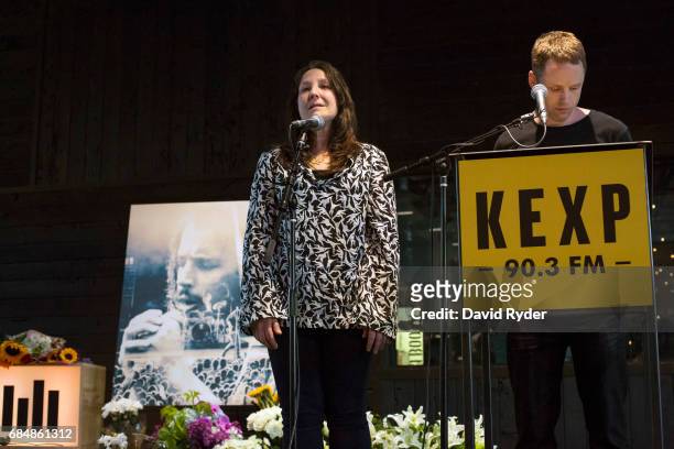 DJs Cheryl Waters and John Richards speak during a memorial for musician Chris Cornell at the KEXP radio studio on May 18, 2017 in Seattle,...