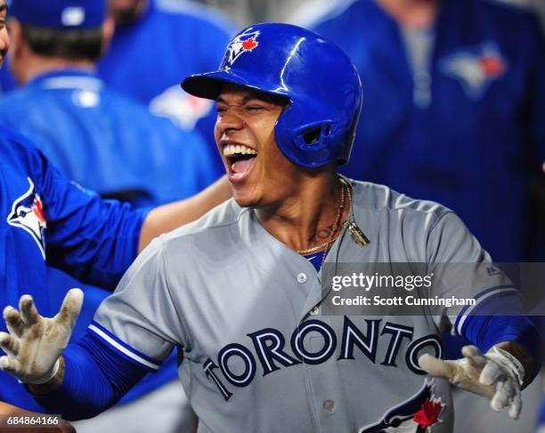 Marcus Stroman of the Toronto Blue Jays is congratulated by teammates after hitting a fourth inning solo home run against the Atlanta Braves at...