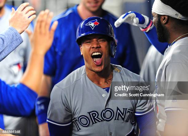 Marcus Stroman of the Toronto Blue Jays is congratulated by teammates after hitting a fourth inning solo home run against the Atlanta Braves at...
