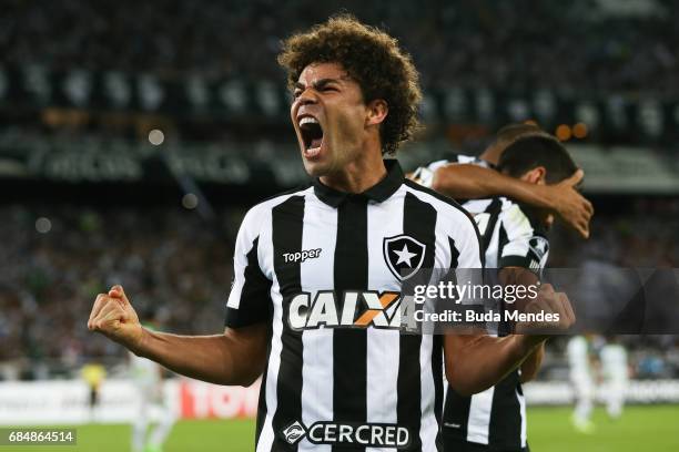 Camilo of Botafogo celebrates a goal by Rodrigo Pimpao against Atletico Nacional during a match between Botafogo and Atletico Nacional as part of...