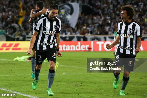 Rodrigo Pimpao and Camilo of Botafogo celebrate a scored goal against Atletico Nacional during a match between Botafogo and Atletico Nacional as part...