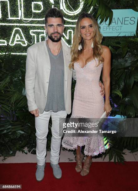 Juanes and his wife Karen Martinez are seen at the premiere of "The Juanes Effect" at Faena Forum on May 18, 2017 in Miami Beach, Florida.