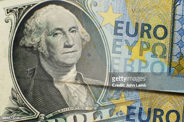 dollar and euro close-up - euro money stock pictures, royalty-free photos & images