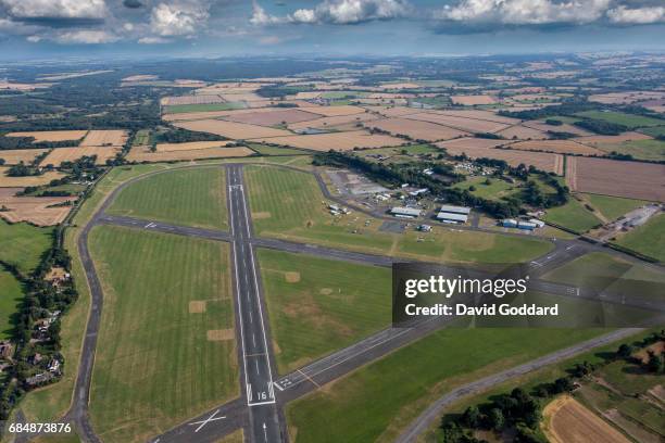 An Aerial view of Halfpenny Green Airport on August 16, 2016. Also known as Wolverhampton Business Airport, and Bobbington Airport, located near the...