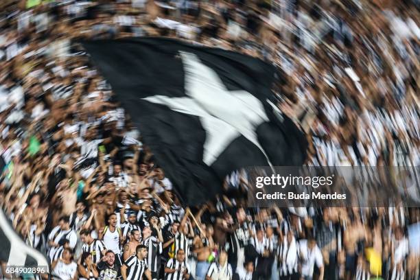 Fans of Botafogo celebrates the victory against Atletico Nacional during a match between Botafogo and Atletico Nacional as part of Copa Bridgestone...