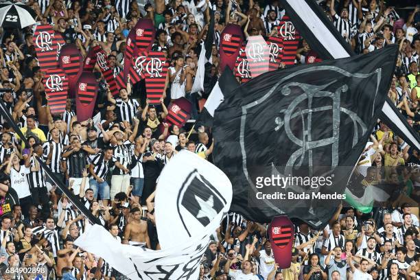 Fans of Botafogo celebrates the victory against Atletico Nacional during a match between Botafogo and Atletico Nacional as part of Copa Bridgestone...