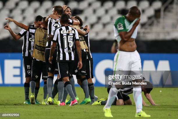 Players of Botafogo celebrates the victory against Atletico Nacional during a match between Botafogo and Atletico Nacional as part of Copa...