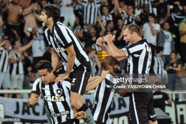 Brazil's Botafogo team players celebrate their 1-0 win at the end of their 2017 Copa Libertadores football match against Colombia's Atletico Nacional...