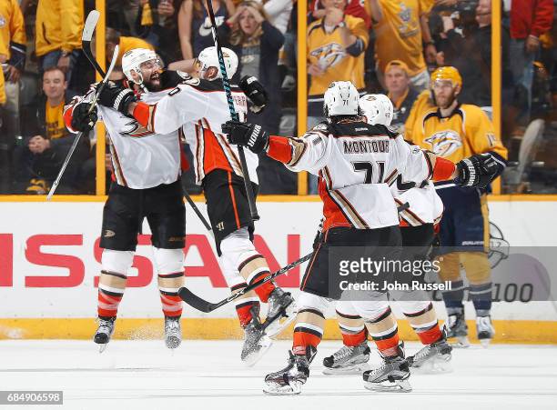 Nate Thompson celebrates his overtime game winning goal with Corey Perry of the Anaheim Ducks against the Nashville Predators in Game Four of the...