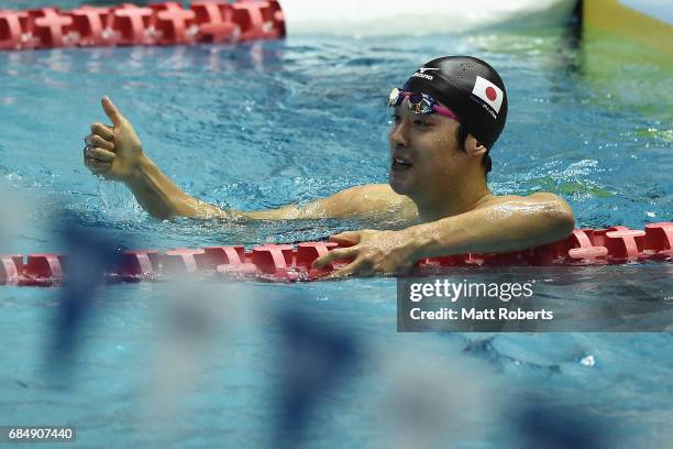 Masato Sakai of Japan reacts after the 100m Backstroke heats during the Japan Open 2017 at Tokyo Tatsumi International Swimming Pool on May 19, 2017...