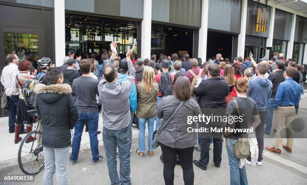 Fans gather to grieve during a memorial for Chris Cornell at the KEXP radio studio on May 18, 2017 in Seattle, Washington.