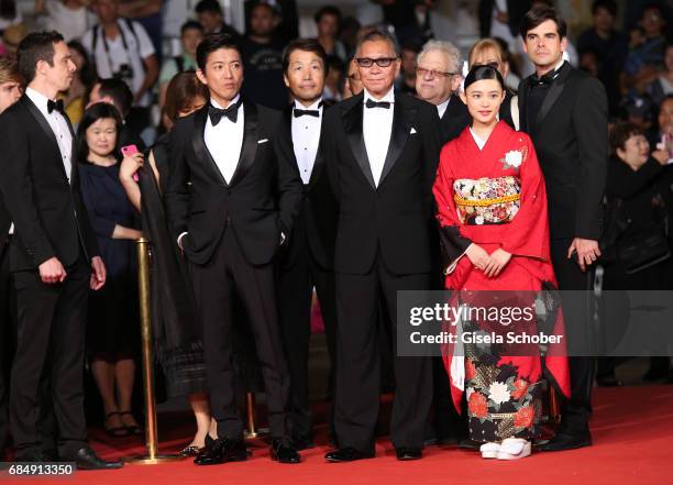 Takuya Kimura, director Takashi Miike and Hana Sugisaki attend the "Blade Of The Immortal " premiere during the 70th annual Cannes Film Festival at...