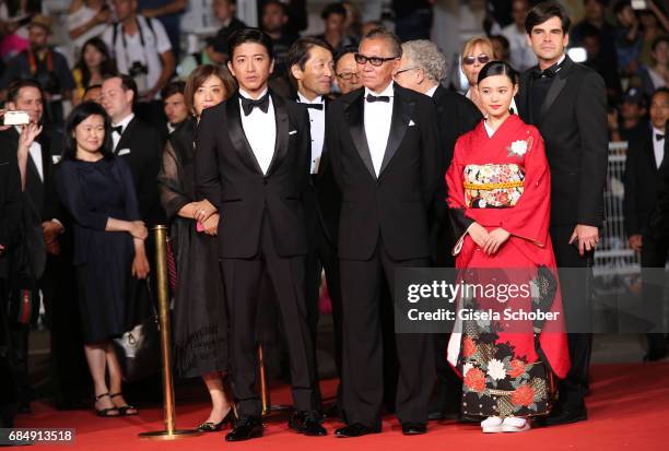 Takuya Kimura, director Takashi Miike and Hana Sugisaki attend the "Blade Of The Immortal " premiere during the 70th annual Cannes Film Festival at...