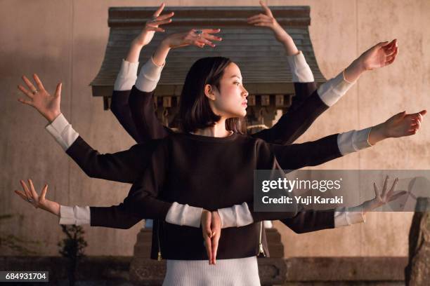 praying, posing, simulating - symmetrical stock-fotos und bilder