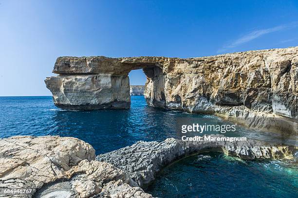 view near the natural arch called azure window - gozo malta fotografías e imágenes de stock