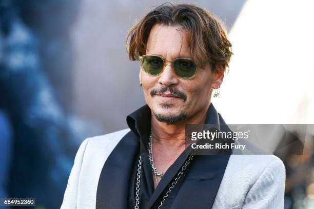 Actor Johnny Depp attends the premiere of Disney's 'Pirates Of The Caribbean: Dead Men Tell No Tales' at Dolby Theatre on May 18, 2017 in Hollywood,...