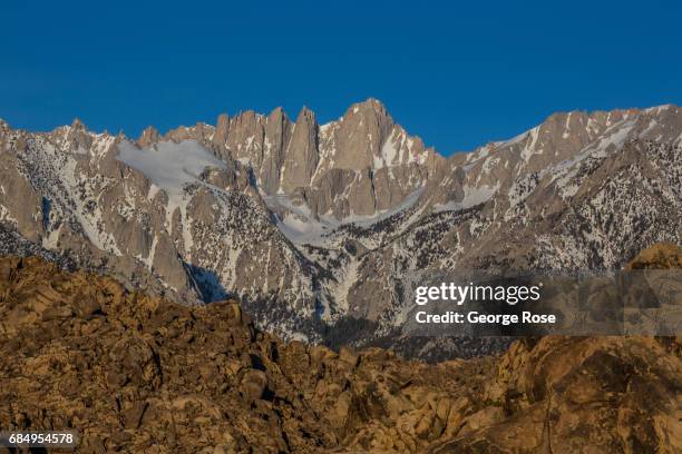 The jagged edges of Mt. Whitney are viewed from the scenic Alabama Hills at sunrise on April 6 near Lone Pine, California. Owens Valley is an arid...
