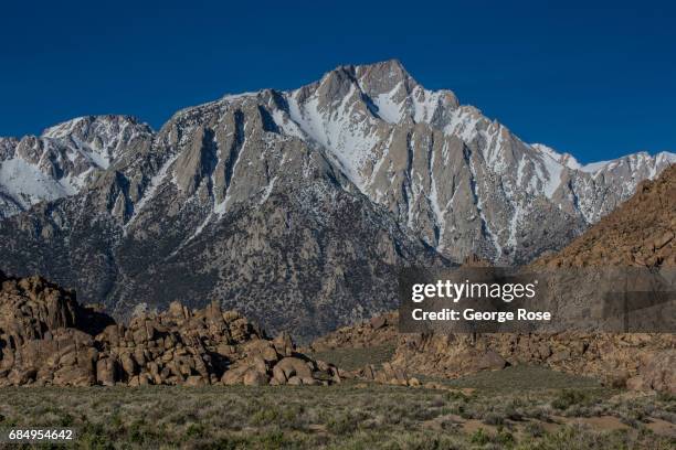The Sierra Nevada Mountains are viewed from the scenic Alabama Hills at sunrise on April 6 near Lone Pine, California. Owens Valley is an arid valley...