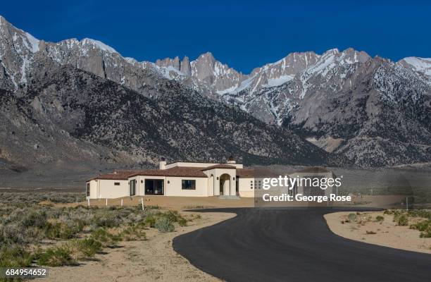 The Sierra Nevada Mountains are viewed from the Portal Preserve housing development after sunrise on April 6 near Lone Pine, California. Owens Valley...