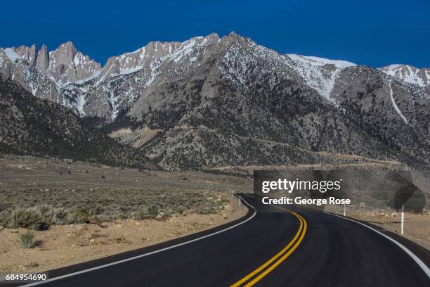 The Sierra Nevada Mountains are viewed from Whitney Portal Road after sunrise on April 6 near Lone Pine, California. Owens Valley is an arid valley...
