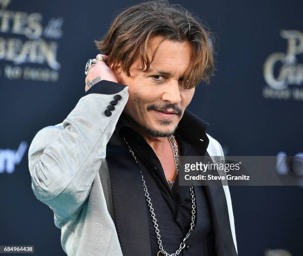Johnny Depp arrives at the Premiere Of Disney's "Pirates Of The Caribbean: Dead Men Tell No Tales" at Dolby Theatre on May 18, 2017 in Hollywood,...