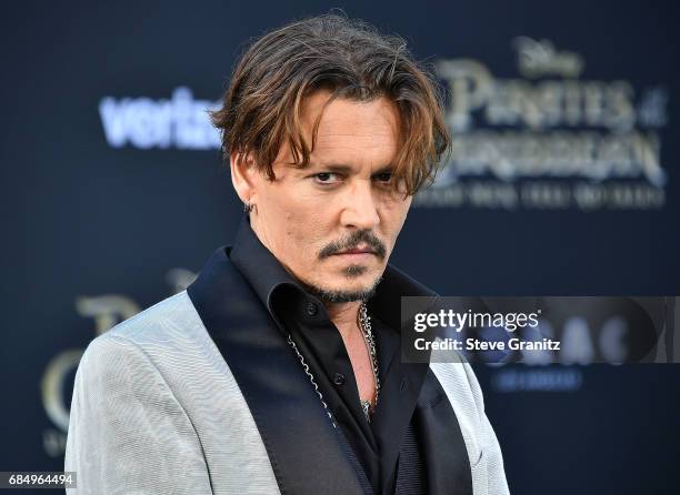 Johnny Depp arrives at the Premiere Of Disney's "Pirates Of The Caribbean: Dead Men Tell No Tales" at Dolby Theatre on May 18, 2017 in Hollywood,...