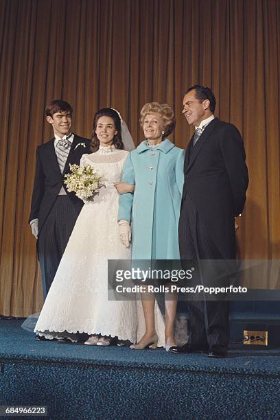 President Elect of the United States, Richard Nixon pictured with his wife Pat Nixon at the wedding of their daughter Julie and David Eisenhower in...