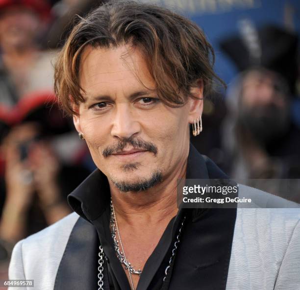 Actor Johnny Depp arrives at the premiere of Disney's "Pirates Of The Caribbean: Dead Men Tell No Tales" at Dolby Theatre on May 18, 2017 in...