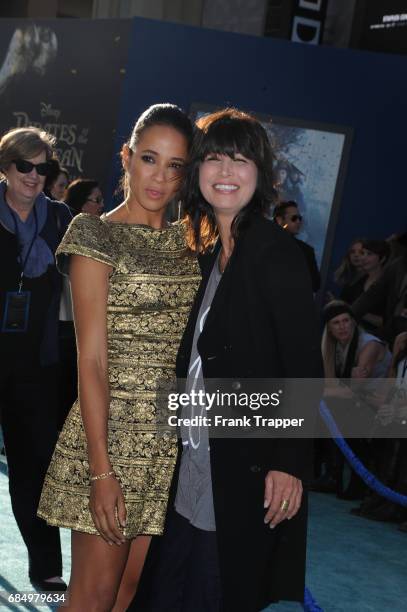 Actress Dania Ramirez and Elizabeth Keener arrive at the premiere of Disney's "Pirates of the Caribbean: Dead Men Tell No Tales" at the Dolby Theatre...