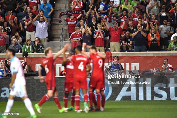 Chicago Fire fans celebrate after a goal during a game against the Seattle Sounders and the Chicago Fire on May 13 at Toyota Park, in Bridgeview, IL....