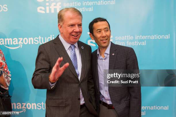 Seattle Mayor Ed Murray and his husband Michael Shiosaki arrive at the opening night gala of the Seattle International Film Festival on May 18, 2017...