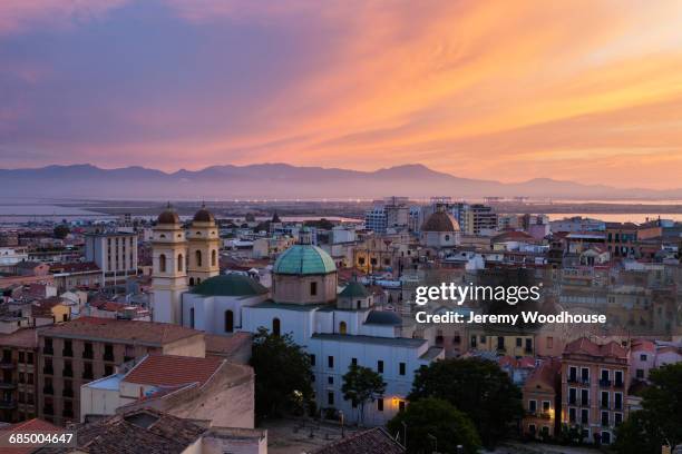 waterfront cityscape at sunset, cagliari, provincia di cagliari, italy, - sardinien stock-fotos und bilder