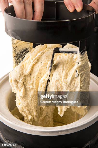 hands lifting homemade ice cream - homemade icecream stock pictures, royalty-free photos & images