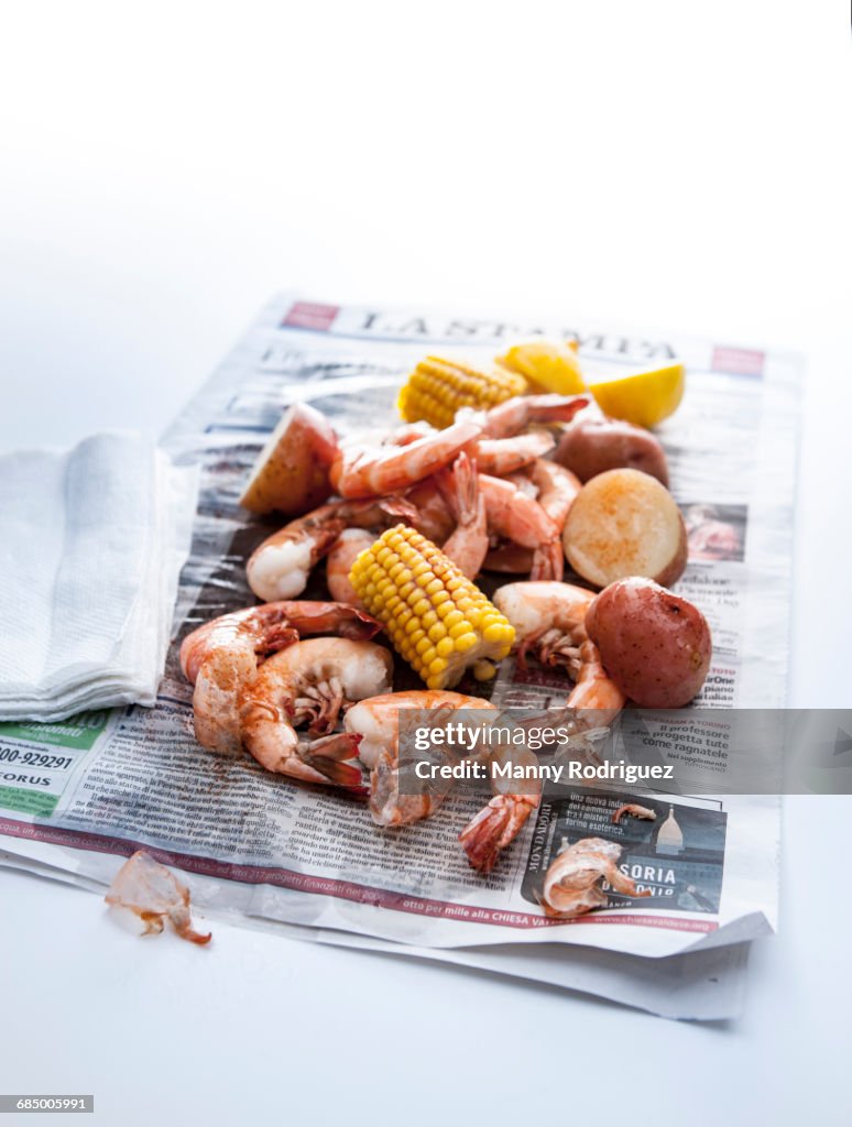 Seafood boil on newspaper