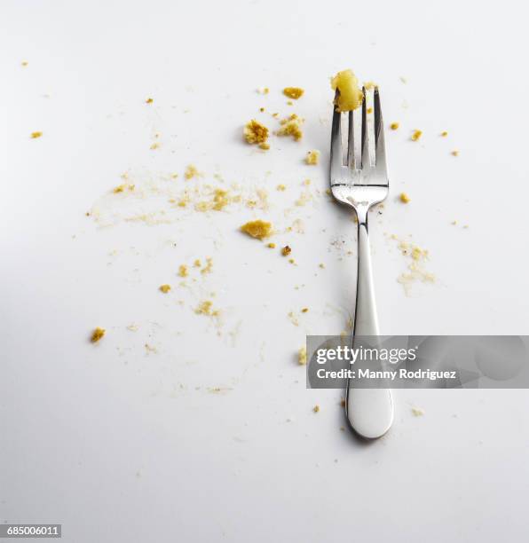 fork with crumbs of apple pie - crumb stock pictures, royalty-free photos & images