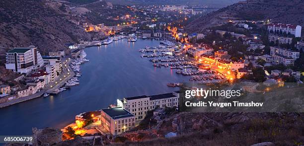 high angle cityscape of balaklava bay, sevastopol city at dawn, crimea, ukraine - crimea foto e immagini stock