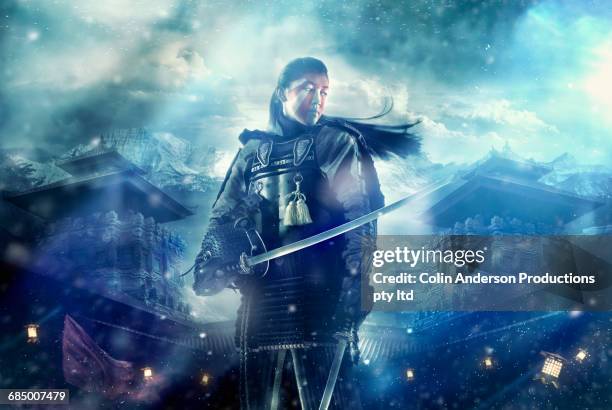 chinese warrior holding swords on foggy battlefield - warrior stock-fotos und bilder
