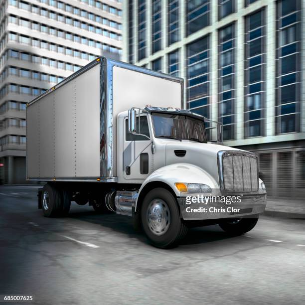 shiny delivery truck driving in city - van driver stock pictures, royalty-free photos & images