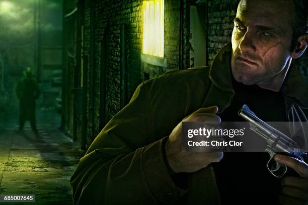 suspicious man with scar on face holding gun in alley - chris dangerous stock pictures, royalty-free photos & images