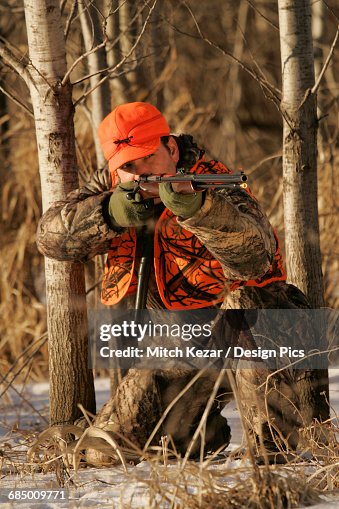 Hunter Aims Muzzleloader Hunter Aims Muzzleloader
