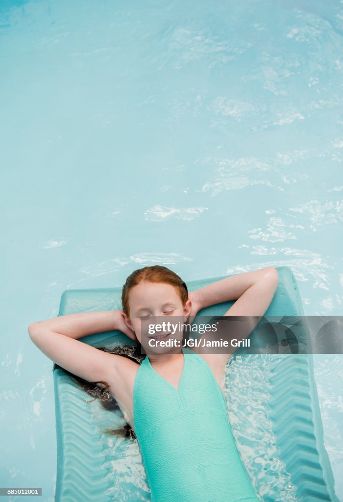 Tween Floating Inpool Caucasian Girl Floating On Pool Raft In Swimming Pool High-Res Stock ...