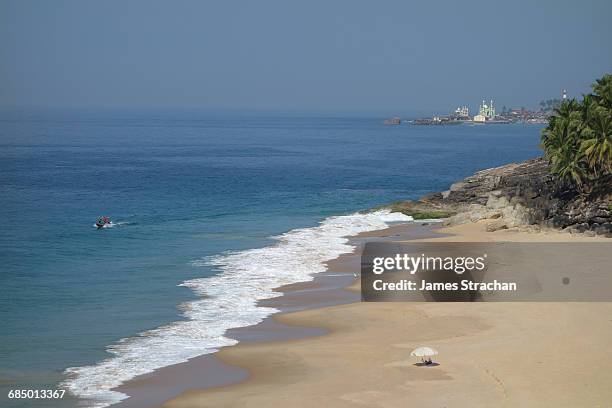 beach and ocean, niraamaya, kovalam, kerala, india, asia - kerala surf stock pictures, royalty-free photos & images