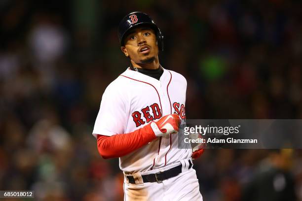 Mookie Betts of the Boston Red Sox looks on during a game against the Chicago Cubs at Fenway Park on April 30, 2017 in Boston, Massachusetts.