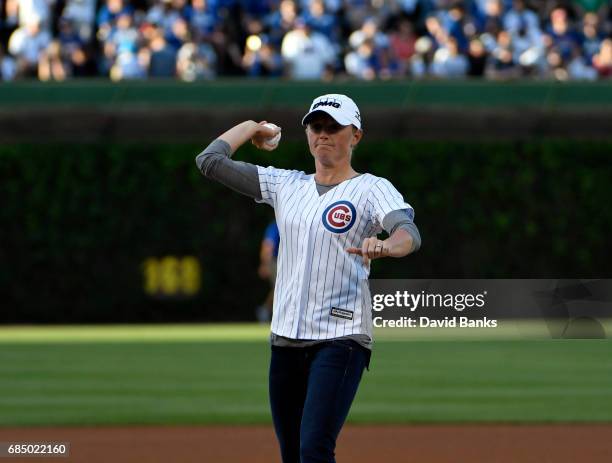 Golfer Stacy Lewis throws out a ceremonial first pitch before the game between the Chicago Cubs and the Cincinnati Reds on May 16, 2017 at Wrigley...